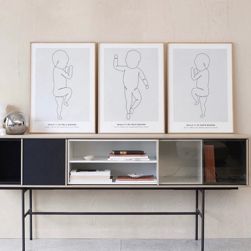 Fødselsprint som viser babyens første størrelse i elegant design